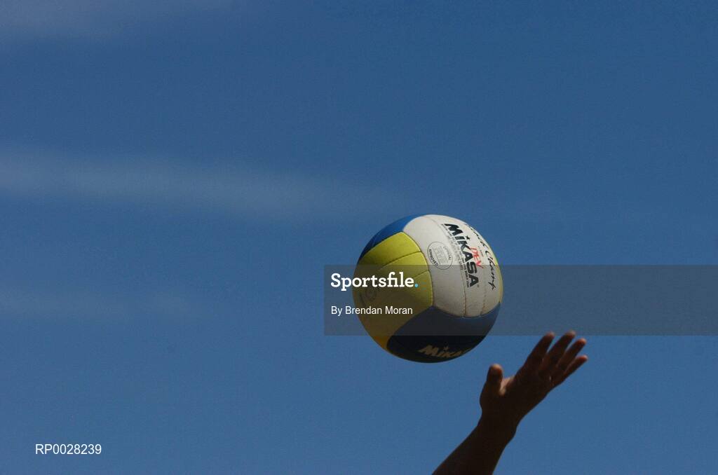 15 July 2006; A player serves the ball. Coca-Cola Bray Beach Volleyball Event, Sand Area, Women's Round Robin, Dignam / P. Walsh v Kuncik / Rossiter, Bray Beach, Bray, Co. Wicklow. Picture credit: Brendan Moran / SPORTSFILE