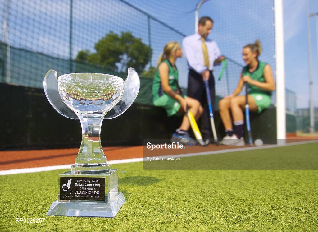 20 July 2006; Sean Kelly, newly appointed Executive Chairman of the The Irish Institute of Sport, with Nicola Evans, right, Vice-Captain, and Chloe Watkins, members of the Ireland U16 girls hockey team who recently won bronze medal in the EuroHockey Youth Nations Championships in Valencia, Spain. Belfield, UCD, Dublin. Picture credit: Brian Lawless / SPORTSFILE