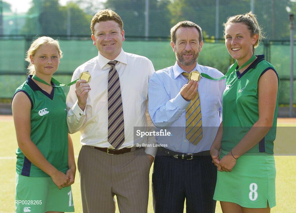 20 July 2006; Sean Kelly, newly appointed Executive Chairman of the The Irish Institute of Sport, and Paul Varian, Chief Executive, Irish Hockey Association, with Nicola Evans, right, Vice-Captain, and Chloe Watkins, members of the Ireland U16 girls hockey team who recently won bronze medal in the EuroHockey Youth Nations Championships in Valencia, Spain. Belfield, UCD, Dublin. Picture credit: Brian Lawless / SPORTSFILE