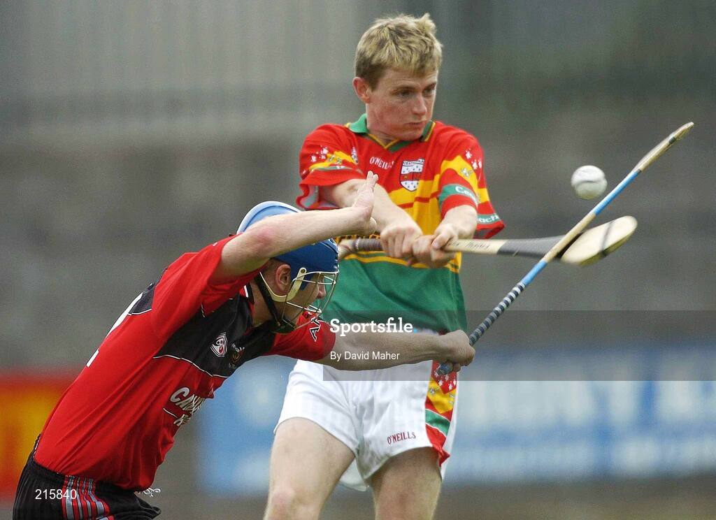 23 July 2006; Colin Hughes, Carlow, in action against Gerard Adair, Down. Christy Ring Cup Semi-Final, Down v Carlow, Cusack Park, Mullingar, Co. Westmeath. Picture credit: David Maher / SPORTSFILE *** Local Caption *** Colin Hughes