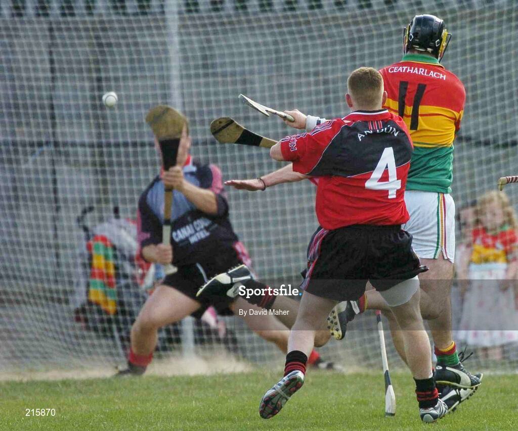 23 July 2006; Des Murphy, 11, Carlow, beats Down goalkeeper Graham Clarke to score his side's second goal. Christy Ring Cup Semi-Final, Down v Carlow, Cusack Park, Mullingar, Co. Westmeath. Picture credit: David Maher / SPORTSFILE