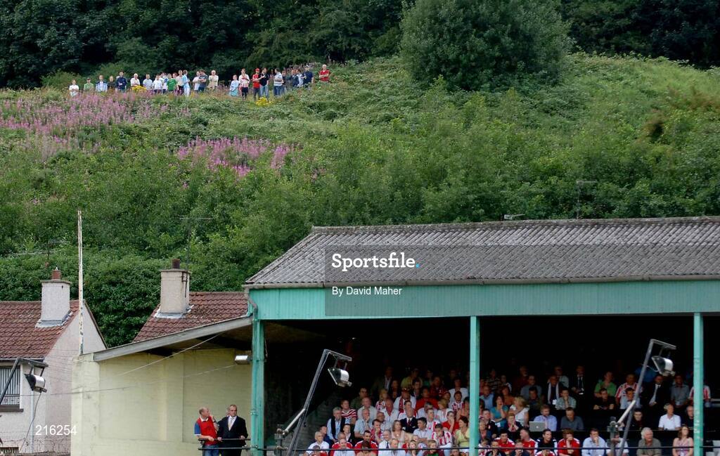 27 July 2006; Supporters watch on from the stand and a vantage point over looking the Brandywell. UEFA Cup 1st Round, 2nd Leg, Derry City v IFK Gothenburg, Brandywell, Derry. Picture credit; David Maher / SPORTSFILE