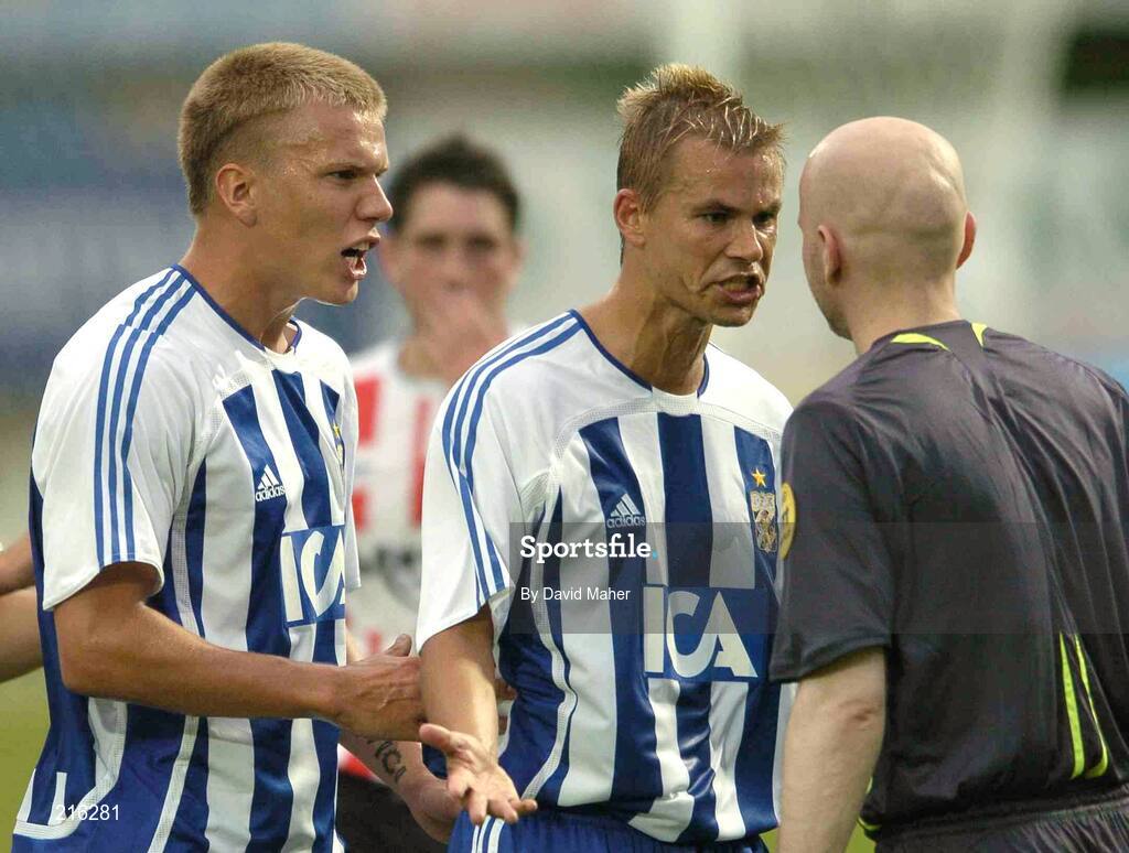 27 July 2006; IFK Gothenburg players Adam Johannsson, left and Nicolas Alexandersson remonstrate with referee Gardar Hinriksson after his penalty decision, in favour of IFK Gothenburg, was overturned by an assistant referee. UEFA Cup 1st Round, 2nd Leg, Derry City v IFK Gotheburg, Brandywell, Derry. Picture credit; David Maher / SPORTSFILE