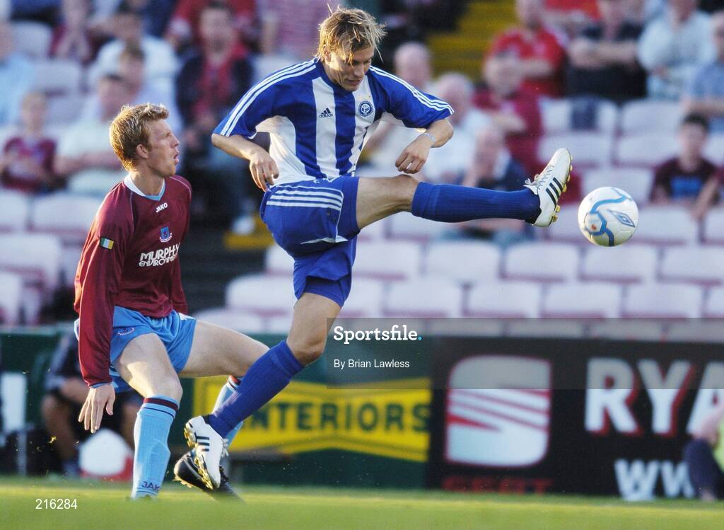 27 July 2006; Veli Lampi, HJK Helsinki, in action against Glen Fitzpatrick, Drogheda United. UEFA Cup 1st Round, 2nd Leg, Drogheda United v HJK Helsinki, Dalymount Park, Dublin. Picture credit; Brian Lawless / SPORTSFILE
