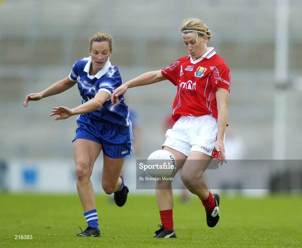 29 July 2006; Amanda Murphy, Cork, in action against Mary O'Donnell, Waterford. TG4 Ladies Munster Senior Football Final, Cork v Waterford, Gaelic Grounds, Limerick. Picture credit; Brendan Moran / SPORTSFILE