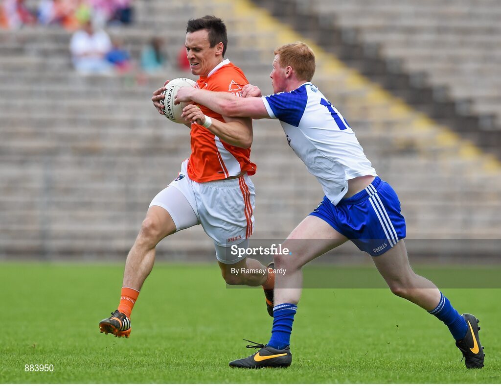 6 July 2014; Mark Shields, Armagh, in action against Paudie McKenna, Monaghan. Ulster GAA Football Senior Championship, Semi-Final Replay, Armagh v Monaghan, St Tiernach's Park, Clones, Co. Monaghan. Picture credit: Ramsey Cardy / SPORTSFILE
