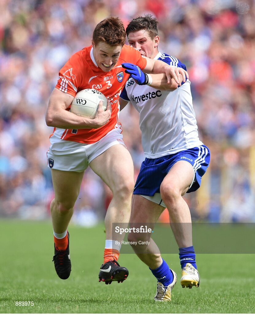 6 July 2014; Charlie Vernon, Armagh, in action against Darren Hughes, Monaghan. Ulster GAA Football Senior Championship, Semi-Final Replay, Armagh v Monaghan, St Tiernach's Park, Clones, Co. Monaghan. Picture credit: Ramsey Cardy / SPORTSFILE