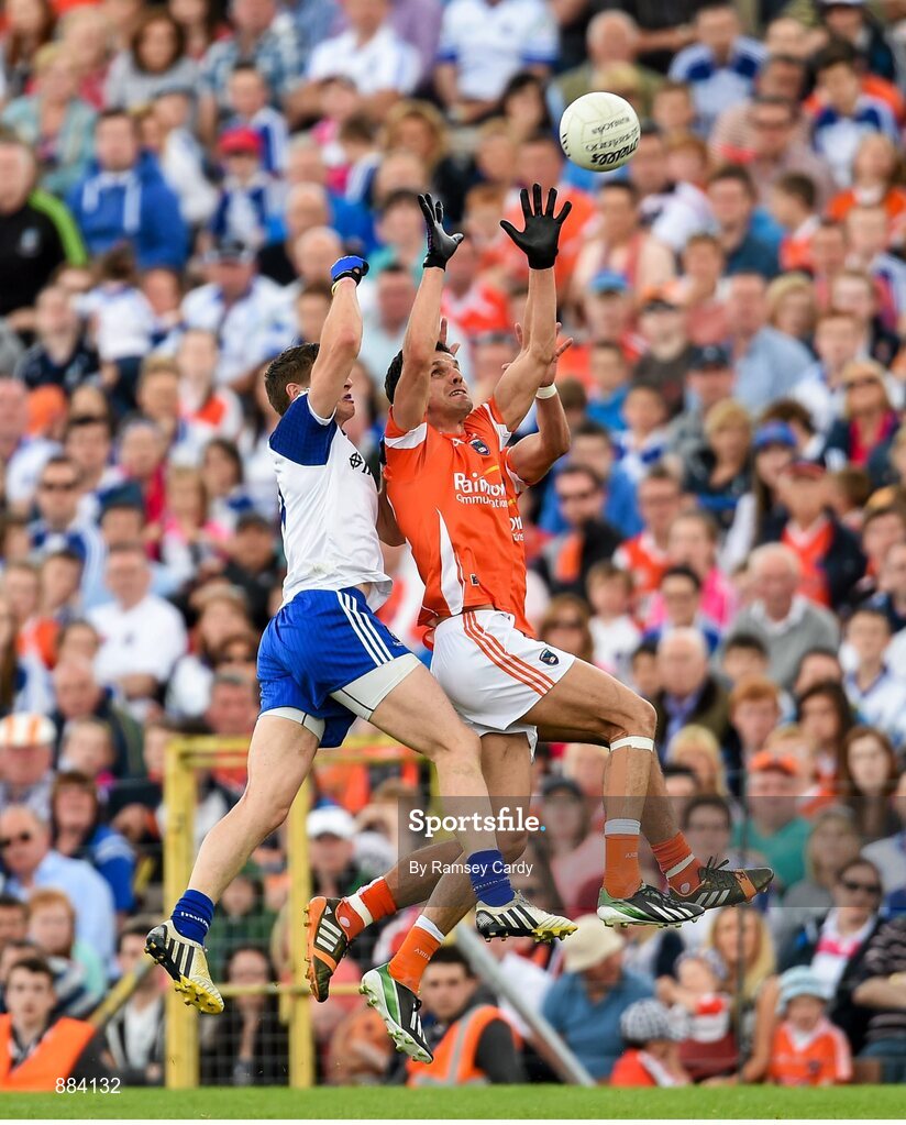 6 July 2014; Stephen Harold, Armagh, in action against Darren Hughes, Monaghan. Ulster GAA Football Senior Championship, Semi-Final Replay, Armagh v Monaghan, St Tiernach's Park, Clones, Co. Monaghan. Picture credit: Ramsey Cardy / SPORTSFILE