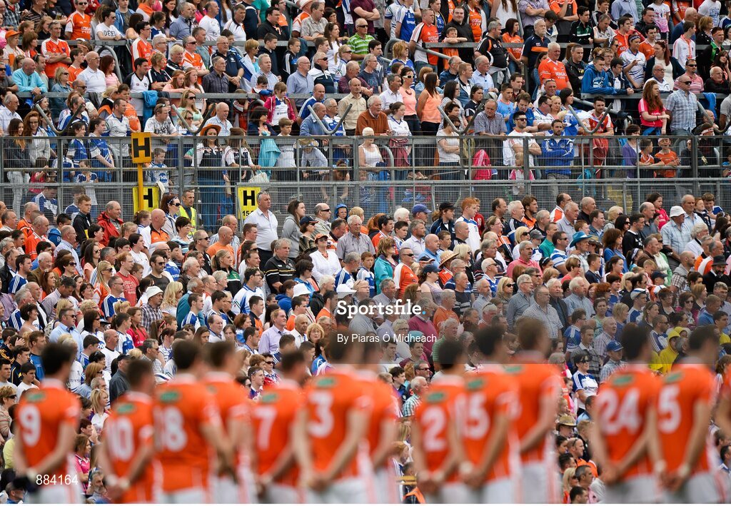 6 July 2014; Armagh players and spectators stand for the National Anthem before the game. Ulster GAA Football Senior Championship, Semi-Final Replay, Armagh v Monaghan, St Tiernach's Park, Clones, Co. Monaghan. Picture credit: Piaras Ó Mídheach / SPORTSFILE