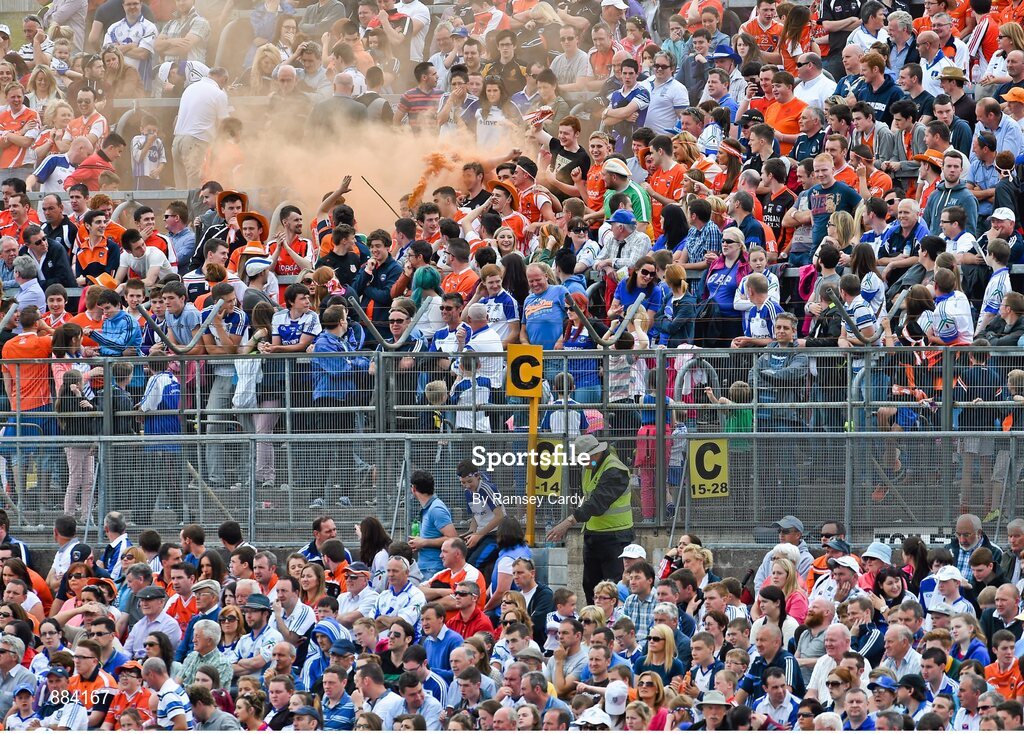 6 July 2014; Armagh supporters let off a smoke bomb during the second half. Ulster GAA Football Senior Championship, Semi-Final Replay, Armagh v Monaghan, St Tiernach's Park, Clones, Co. Monaghan. Picture credit: Ramsey Cardy / SPORTSFILE