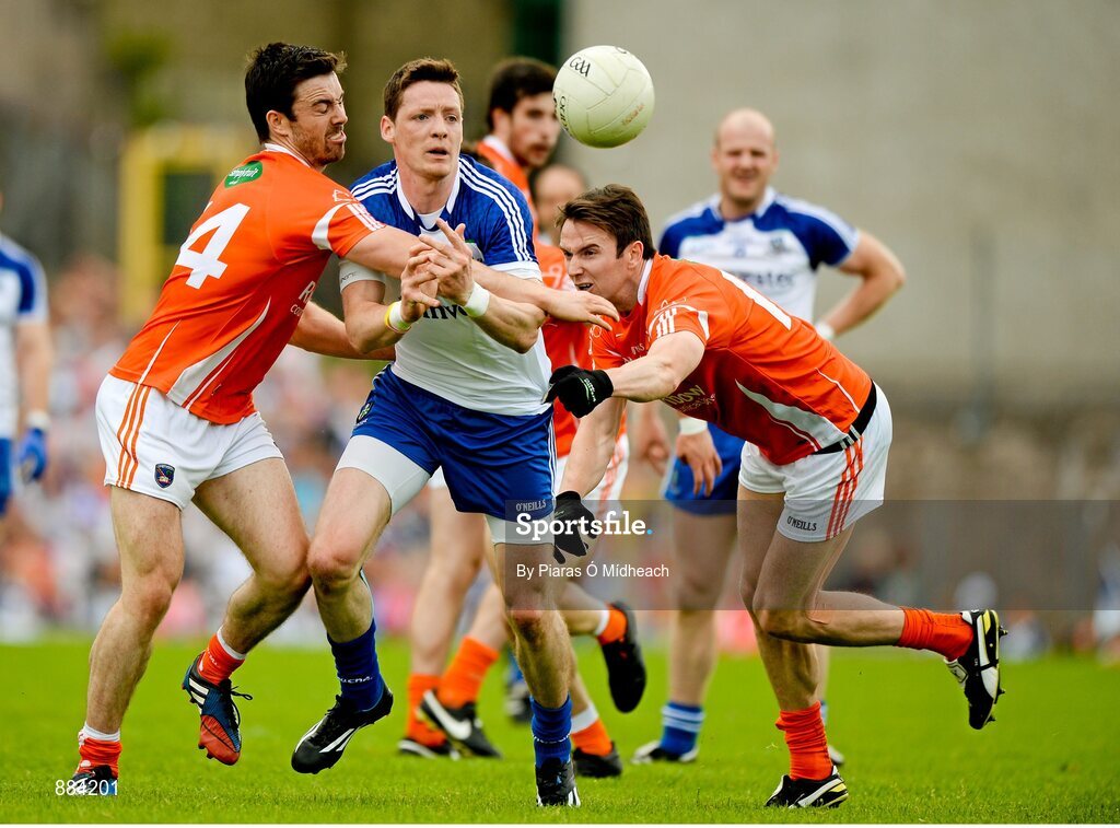6 July 2014; Conor McManus, Monaghan, in action against Aidan Forker, left, and Tony Kernan, Armagh. Ulster GAA Football Senior Championship, Semi-Final Replay, Armagh v Monaghan, St Tiernach's Park, Clones, Co. Monaghan. Picture credit: Piaras Ó Mídheach / SPORTSFILE