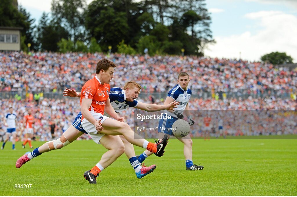6 July 2014; Charlie Vernon, Armagh, in action against Kieran Hughes, Monaghan. Ulster GAA Football Senior Championship, Semi-Final Replay, Armagh v Monaghan, St Tiernach's Park, Clones, Co. Monaghan. Picture credit: Piaras Ó Mídheach / SPORTSFILE