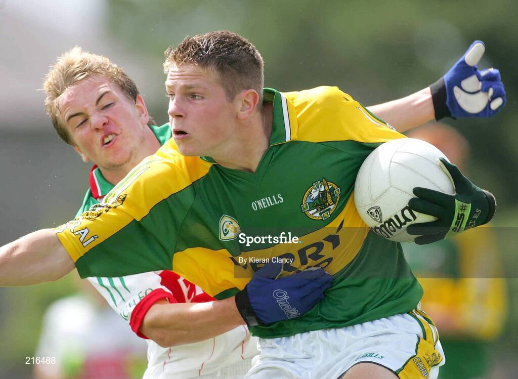 30 July 2006; Garry O'Driscoll, Kerry, in action against Donal Gallagher, Mayo. ESB All-Ireland Minor Football Championship Quarter-Final, Kerry v Mayo, Cusack Park, Ennis, Co. Clare. Picture credit; Kieran Clancy / SPORTSFILE