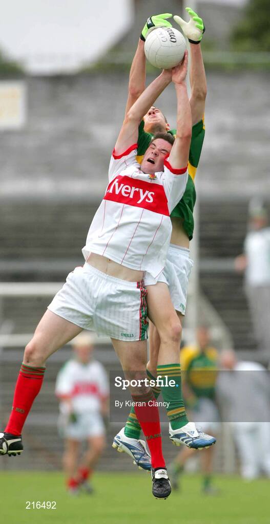 30 July 2006; David Moran, Kerry, in action against Thady Gavin, Mayo. ESB All-Ireland Minor Football Championship Quarter-Final, Kerry v Mayo, Cusack Park, Ennis, Co. Clare. Picture credit; Kieran Clancy / SPORTSFILE