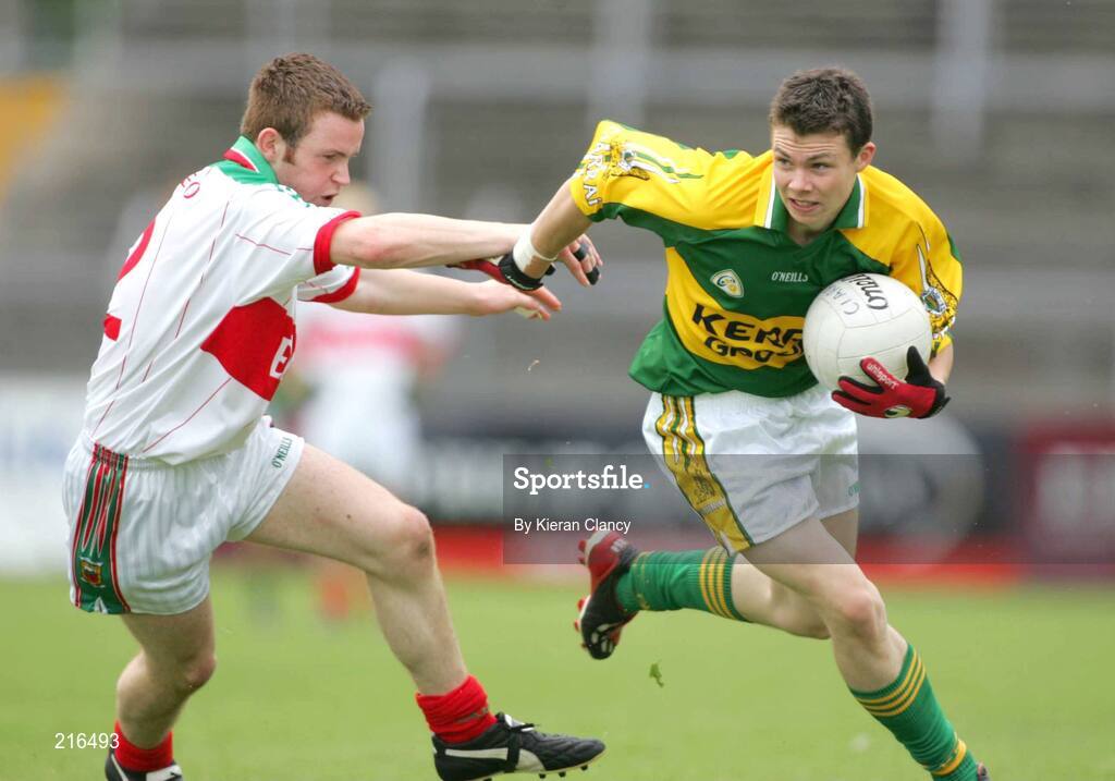 30 July 2006; Jamie Dolan, Kerry, in action against Liam Tunney, Mayo. ESB All-Ireland Minor Football Championship Quarter-Final, Kerry v Mayo, Cusack Park, Ennis, Co. Clare. Picture credit; Kieran Clancy / SPORTSFILE