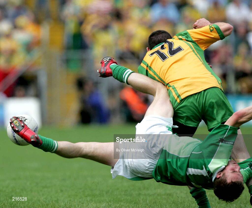 30 July 2006; Eamon Maguire, Fermanagh, in a tackle against Ciaran Bonner, Donegal which ended in a suspected broken Jaw. Bank of Ireland All-Ireland Senior Football Championship Qualifier, Round 4, Fermanagh v Donegal, Brewster Park, Enniskillen, Co. Fermanagh. Picture credit; Oliver McVeigh / SPORTSFILE