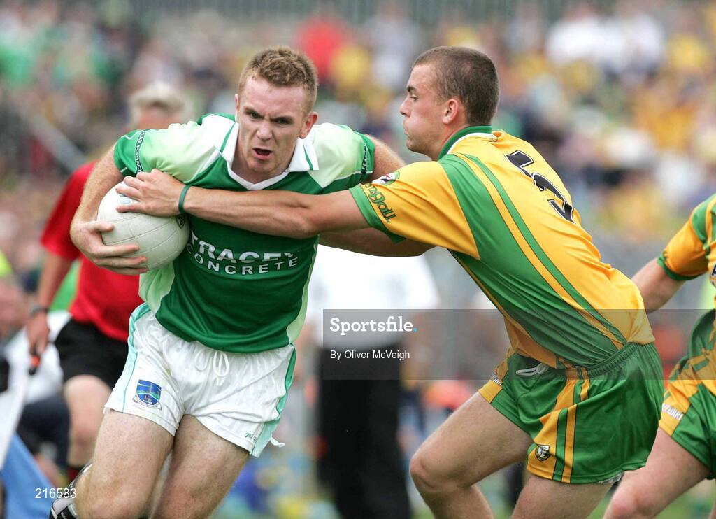 30 July 2006; Martin McGrath, Fermanagh, in action against Eamon McGee, Donegal. Bank of Ireland All-Ireland Senior Football Championship Qualifier, Round 4, Fermanagh v Donegal, Brewster Park, Enniskillen, Co. Fermanagh. Picture credit; Oliver McVeigh / SPORTSFILE