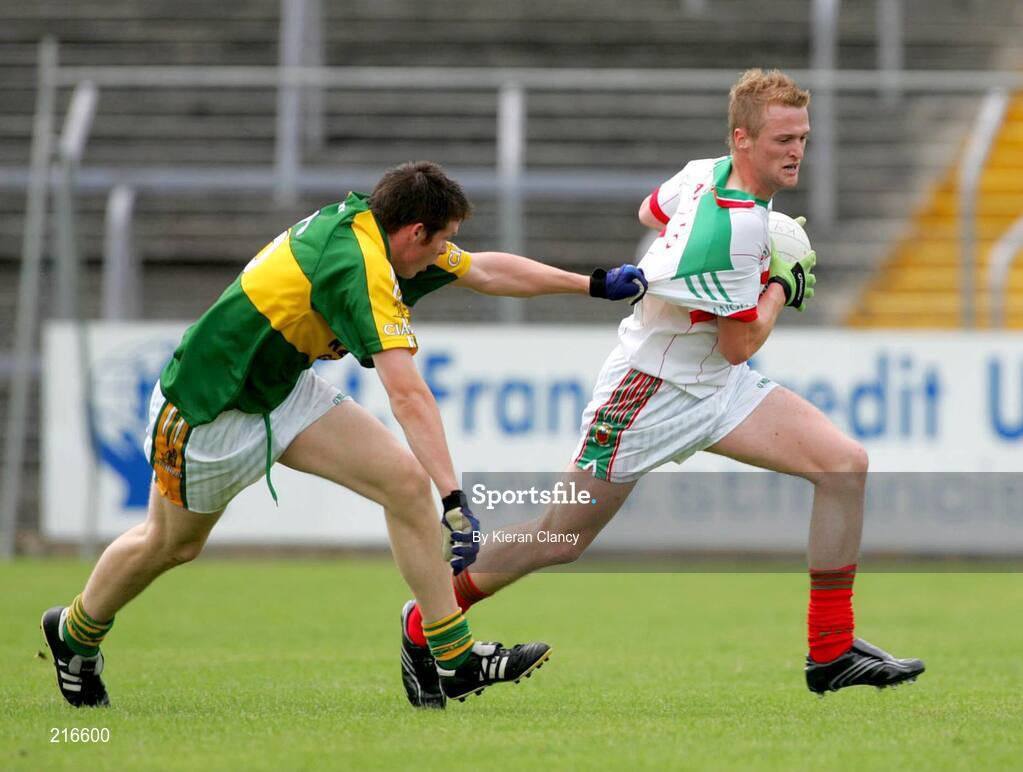 30 July 2006; Kieran Barrett, Mayo, in action against Adrain Greaney, Kerry. ESB All-Ireland Minor Football Championship Quarter-Final, Kerry v Mayo, Cusack Park, Ennis, Co. Clare. Picture credit; Kieran Clancy / SPORTSFILE