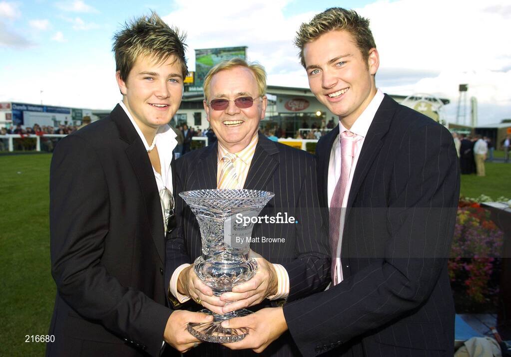 31 July 2006; John Mahon, owner of P'tit Fute, with his sons Robers, left, and John Jnr, with the trophy after winning the G.P.T. Galway Q.R. Handicap. Galway Races, Ballybrit, Co. Galway. Picture credit; Matt Browne / SPORTSFILE