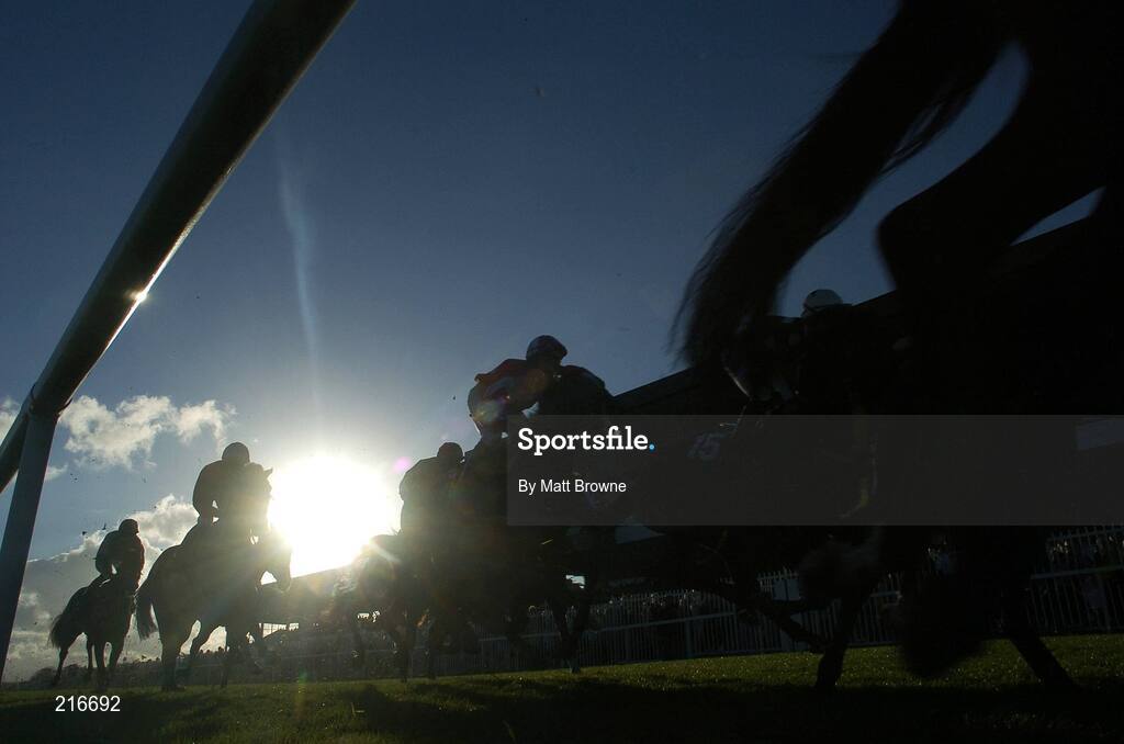 31 July 2006; The runners and riders pass the main stand first time round during the G.P.T. Van and Truck Rentals Handicap. Galway Races, Ballybrit, Co. Galway. Picture credit; Matt Browne / SPORTSFILE