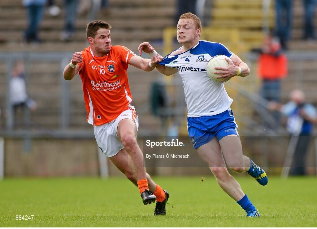 6 July 2014; Colin Walshe, Monaghan, in action against Eugene McVerry, Armagh. Ulster GAA Football Senior Championship, Semi-Final Replay, Armagh v Monaghan, St Tiernach's Park, Clones, Co. Monaghan. Picture credit: Piaras Ó Mídheach / SPORTSFILE