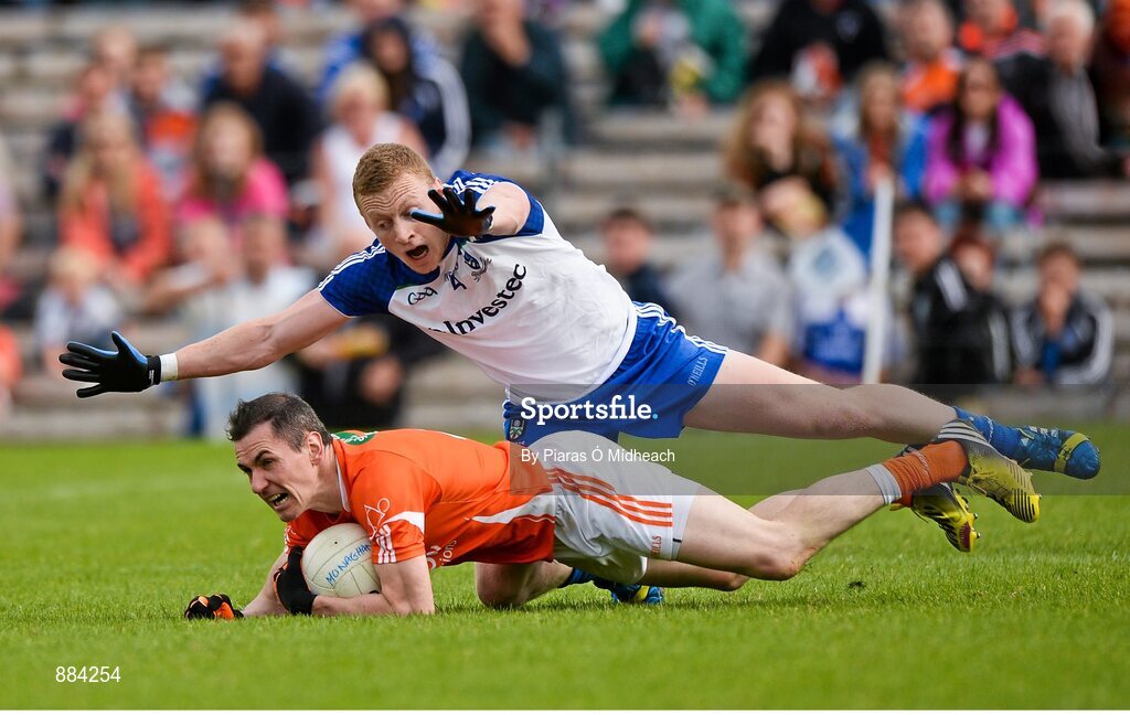 6 July 2014; Andy Mallon, Armagh, in action against Colin Walshe, Monaghan. Ulster GAA Football Senior Championship, Semi-Final Replay, Armagh v Monaghan, St Tiernach's Park, Clones, Co. Monaghan. Picture credit: Piaras Ó Mídheach / SPORTSFILE