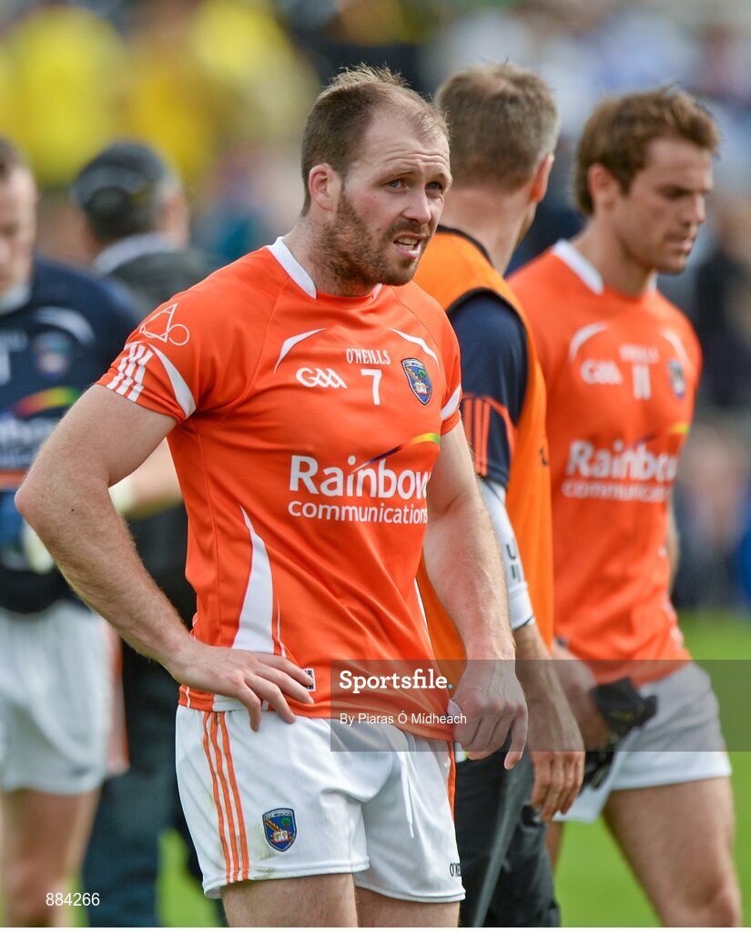 6 July 2014; A dejected Ciaran McKeever, Armagh, leaves the field after the game. Ulster GAA Football Senior Championship, Semi-Final Replay, Armagh v Monaghan, St Tiernach's Park, Clones, Co. Monaghan. Picture credit: Piaras Ó Mídheach / SPORTSFILE