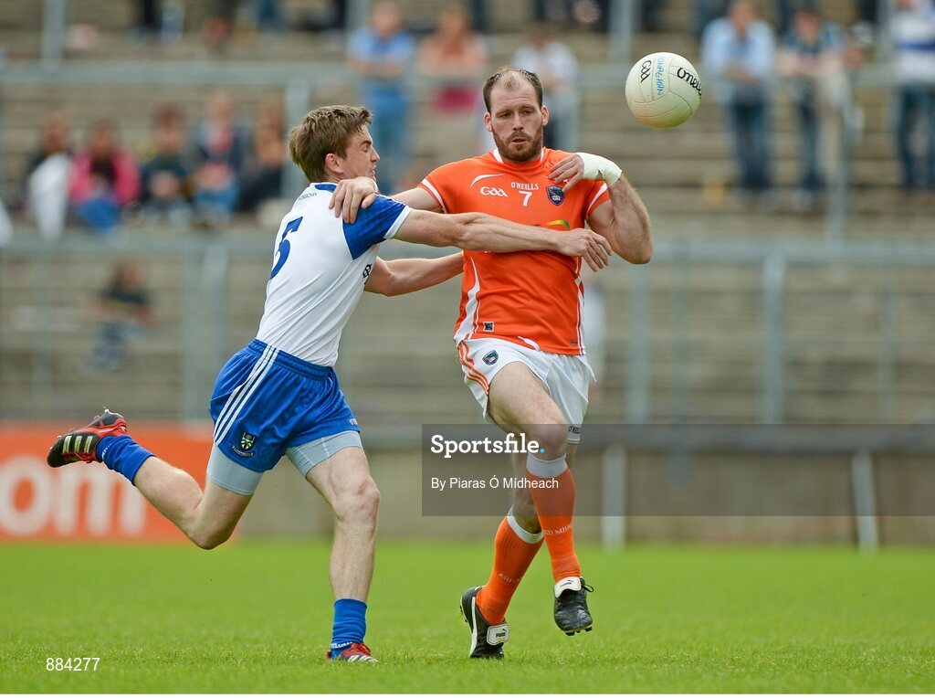 6 July 2014; Ciaran McKeever, Armagh, in action against Dessie Mone, Monaghan. Ulster GAA Football Senior Championship, Semi-Final Replay, Armagh v Monaghan, St Tiernach's Park, Clones, Co. Monaghan. Picture credit: Piaras Ó Mídheach / SPORTSFILE