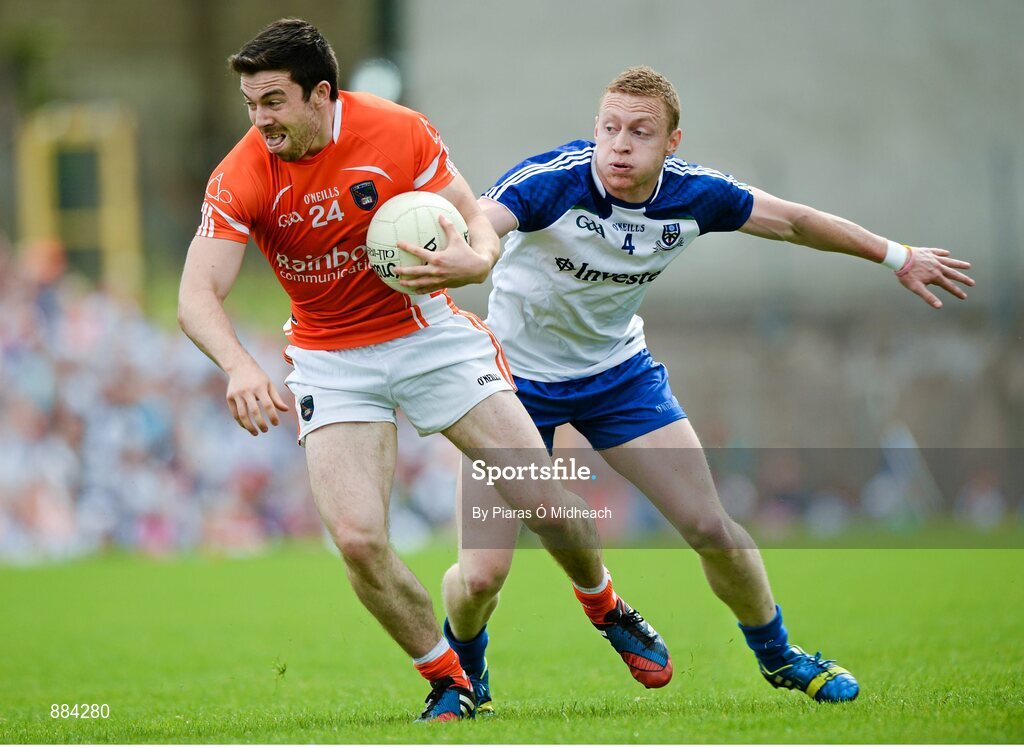 6 July 2014; Aidan Forker, Armagh, in action against Colin Walshe, Monaghan. Ulster GAA Football Senior Championship, Semi-Final Replay, Armagh v Monaghan, St Tiernach's Park, Clones, Co. Monaghan. Picture credit: Piaras Ó Mídheach / SPORTSFILE