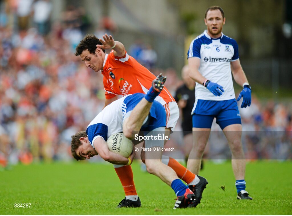 6 July 2014; Dessie Mone, Monaghan, supported by team-mate Vinny Corey, in action against Jamie Clarke, Armagh. Ulster GAA Football Senior Championship, Semi-Final Replay, Armagh v Monaghan, St Tiernach's Park, Clones, Co. Monaghan. Picture credit: Piaras Ó Mídheach / SPORTSFILE