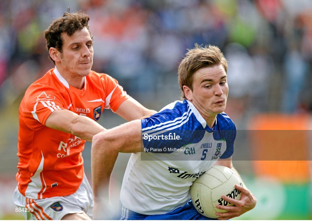 6 July 2014; Dessie Mone, Monaghan, in action against Jamie Clarke, Armagh. Ulster GAA Football Senior Championship, Semi-Final Replay, Armagh v Monaghan, St Tiernach's Park, Clones, Co. Monaghan. Picture credit: Piaras Ó Mídheach / SPORTSFILE