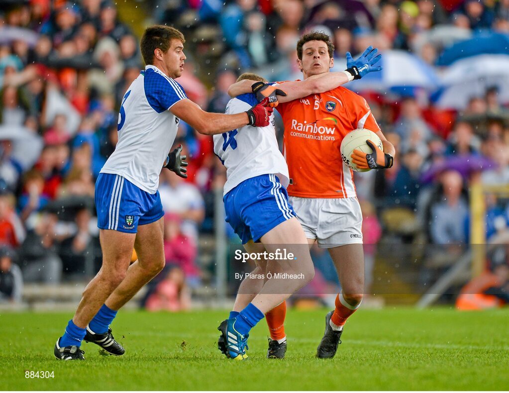 6 July 2014; Jamie Clarke, Armagh, in action against Colin Walshe, and Drew Wylie, left, Monaghan. Ulster GAA Football Senior Championship, Semi-Final Replay, Armagh v Monaghan, St Tiernach's Park, Clones, Co. Monaghan. Picture credit: Piaras Ó Mídheach / SPORTSFILE