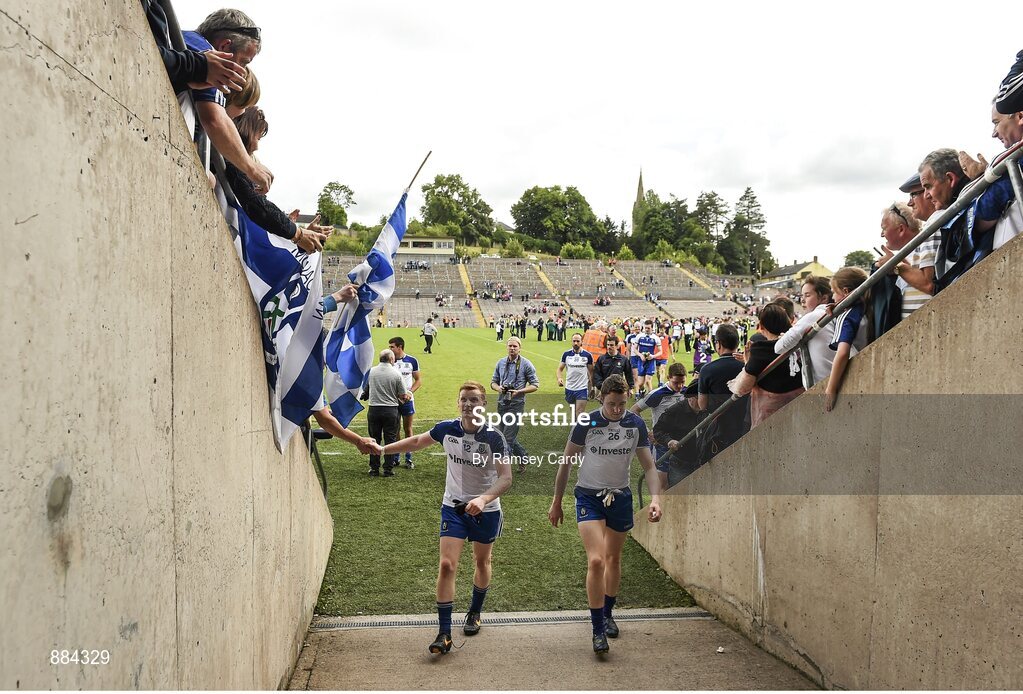 6 July 2014; Monaghan's Paudie McKenna, left, and Owen Duffy, are congratulated by supporters at the end of the game. Ulster GAA Football Senior Championship, Semi-Final Replay, Armagh v Monaghan, St Tiernach's Park, Clones, Co. Monaghan. Picture credit: Ramsey Cardy / SPORTSFILE