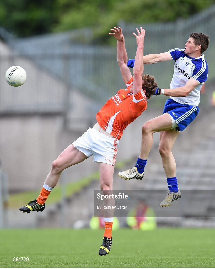 6 July 2014; Kieran Toner, Armagh, in action against Darren Hughes, Monaghan. Ulster GAA Football Senior Championship, Semi-Final Replay, Armagh v Monaghan, St Tiernach's Park, Clones, Co. Monaghan. Picture credit: Ramsey Cardy / SPORTSFILE