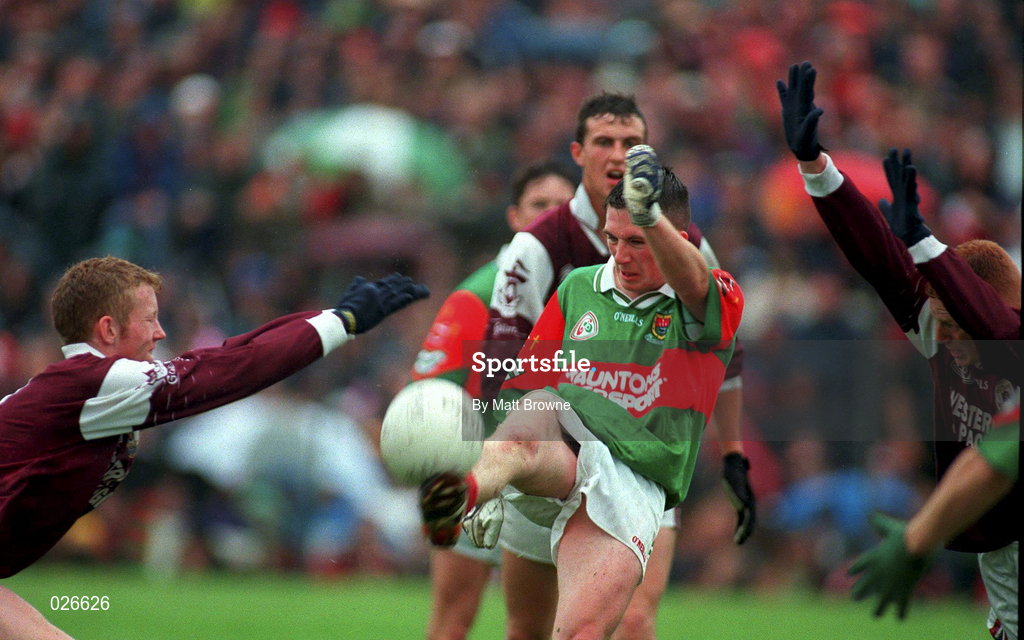 18 July 1999; Alan Dillon of Mayo has his shot blocked by the Galway defence during the Connacht Minor Football Championship Final match between Mayo and Galway at Tuam Stadium in Tuam, Galway. Photo by Matt Browne/Sportsfile