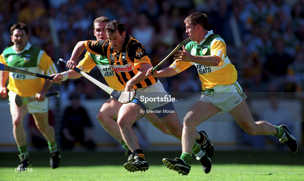 11 July 1999;  Brian McEvoy of Kilkenny in action against Kevin Martin and Paudie Mulhare of Offaly during the Guinness Leinster Senior Hurling Championship Final match between Kilkenny and Offaly at Croke Park in Dublin. Photo by Brendan Moran/Sportsfile