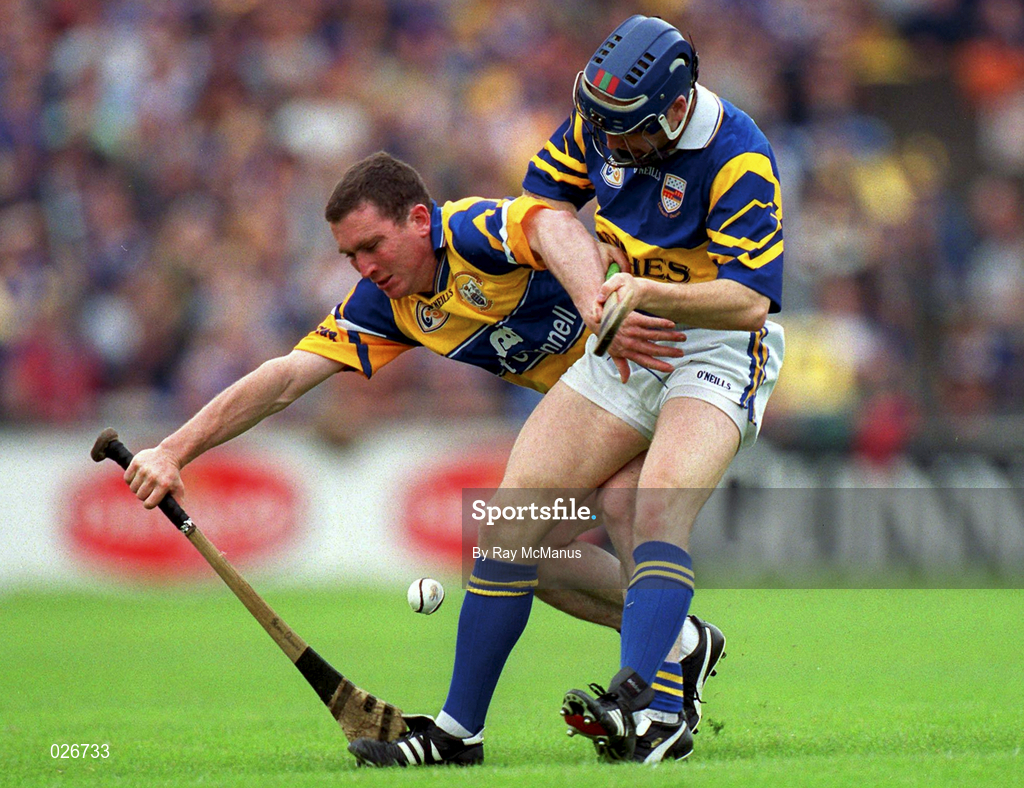 12 June 1999; Brian Quinn of Clare in action against John Leahy of Tipperary during the Munster Senior Hurling Championship Semi final Replay match between Clare v Tipperary at Páirc Uí Chaoimh in Cork. Photo by Ray McManus/Sportsfile