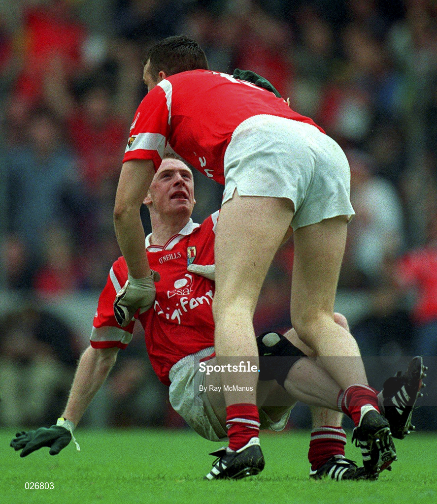 18 July 1999; Philip Clifford of Cork congratulates his team-mate Fachtna Collins on scoring his side's first goal during the Bank of Ireland Munster GAA Football Championship Final match between Cork and Kerry at Páirc Uí Chaoimh in Cork. Photo by Ray McManus/Sportsfile