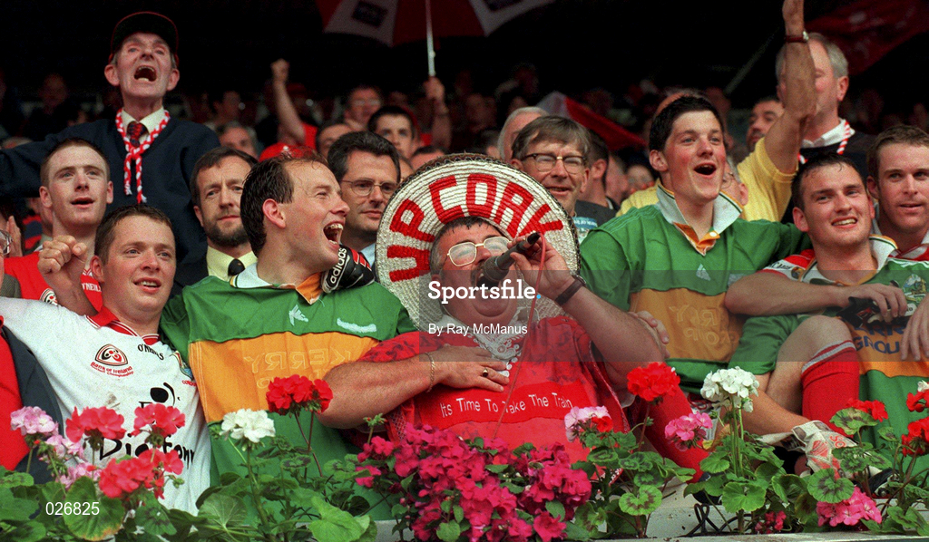 18 July 1999; Cork fan Cyril Kavanagh from Douglas singing the "Banks of the Lee" with Cork players following the Bank of Ireland Munster GAA Football Championship Final match between Cork and Kerry at Páirc Uí Chaoimh in Cork. Photo by Ray McManus/Sportsfile