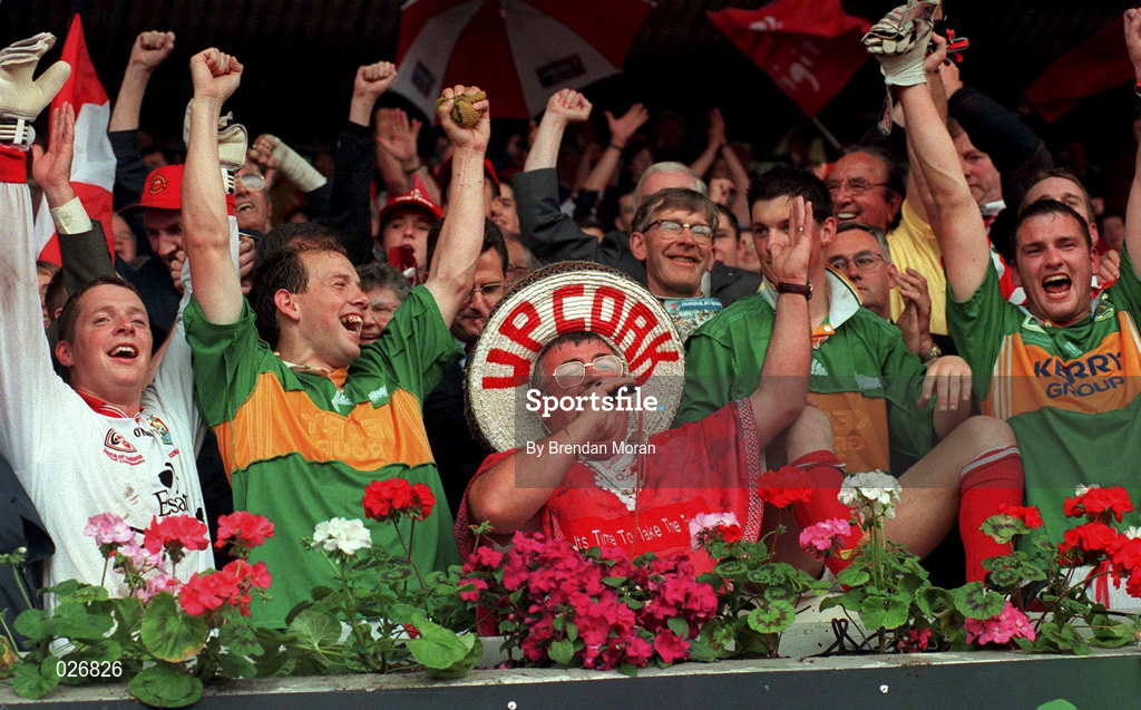 18 July 1999; Cork fan Cyril Kavanagh from Douglas singing the "Banks of the Lee" with Cork players following the Bank of Ireland Munster GAA Football Championship Final match between Cork and Kerry at Páirc Uí Chaoimh in Cork. Photo by Brendan Moran/Sportsfile