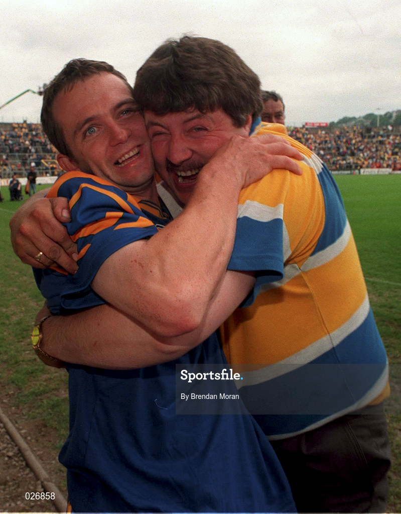 12 June 1999; David Fitzgerald of Clare celebrates with a supporter following the Munster Senior Hurling Championship Semi final Replay match between Clare v Tipperary at Páirc Uí Chaoimh in Cork. Photo by Brendan Moran/Sportsfile