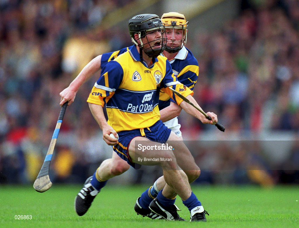 12 June 1999; David Forde of Clare in action against Eamonn Corcoran of Tipperary during the Munster Senior Hurling Championship Semi final Replay match between Clare v Tipperary at Páirc Uí Chaoimh in Cork. Photo by Brendan Moran/Sportsfile