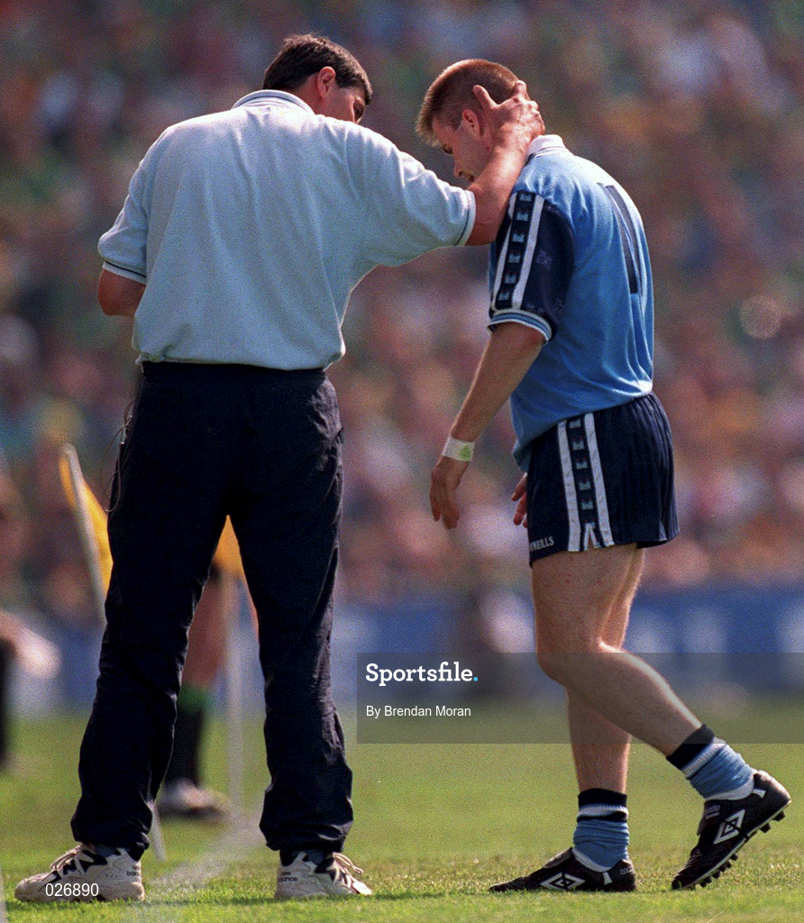 1 August 1999; Dessie Farrell of Dublin leaves the field early in the game after picking up an injury during the Bank of Ireland Leinster Senior Football Championship Final match between Dublin and Meath at Croke Park in Dublin. Photo by Brendan Moran/Sportsfile