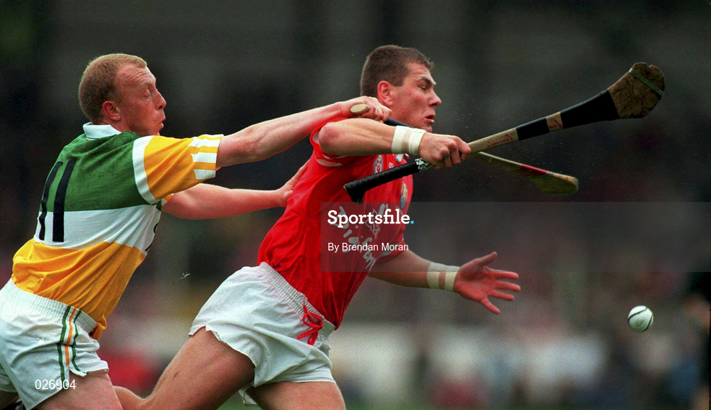 8 August 1999; Diarmuid O'Sullivan of Cork is tackled by  John Troy of Offaly during the Guinness All-Ireland Hurling Senior Championship Semi-Final match between Cork and Offaly at Croke Park in Dublin. Photo by Brendan Moran/Sportsfile
