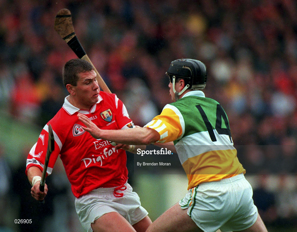 8 August 1999; Diarmuid O'Sullivan of Cork is tackled by Joe Errity of Offaly during the Guinness All-Ireland Hurling Senior Championship Semi-Final match between Cork and Offaly at Croke Park in Dublin. Photo by Brendan Moran/Sportsfile