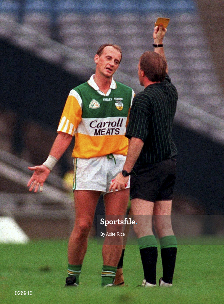 8 August 1999;  Referee Dickie Murphy gives a yellow card to Joe Dooley of Offaly during the Guinness All-Ireland Hurling Senior Championship Semi-Final match between Cork and Offaly at Croke Park in Dublin. Photo by Aoife Rice/Sportsfile