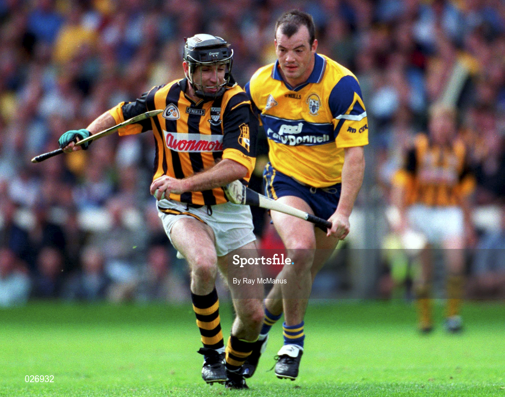 15 August 1999; DJ Carey of Kilkenny in action against Ollie Baker of Clare during the Guinness All-Ireland Senior Hurling Championship Semi-Final match between Kilkenny and Clare at Croke Park in Dublin. Photo by Ray McManus/Sportsfile