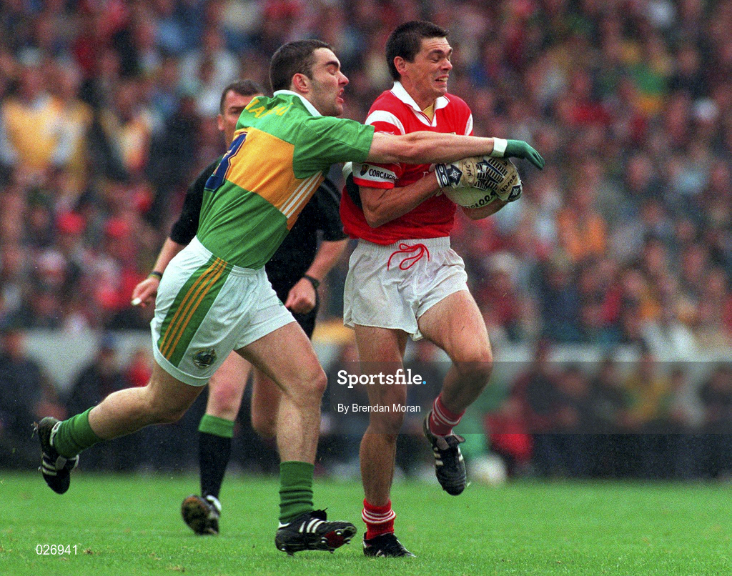 18 July 1999; Don Davis of Cork in action against Barry O'Shea of Kerry during the Bank of Ireland Munster GAA Football Championship Final match between Cork and Kerry at Páirc Uí Chaoimh in Cork. Photo by Brendan Moran/Sportsfile