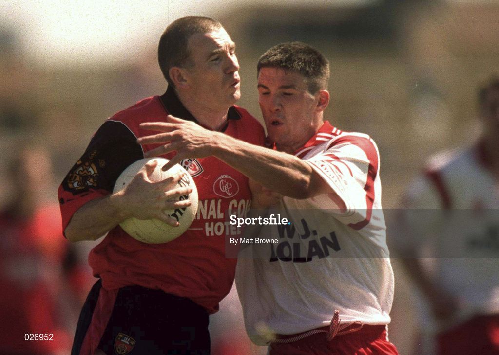 11 July 1999; Ross Carr of Down in action against Ciaran Gourley of Tyrone during the Bank of Ireland Ulster Football Championship Semi Final match between Down and Tyrone at Casement Park in Belfast, Antrim. Photo by Matt Browne/Sportsfile