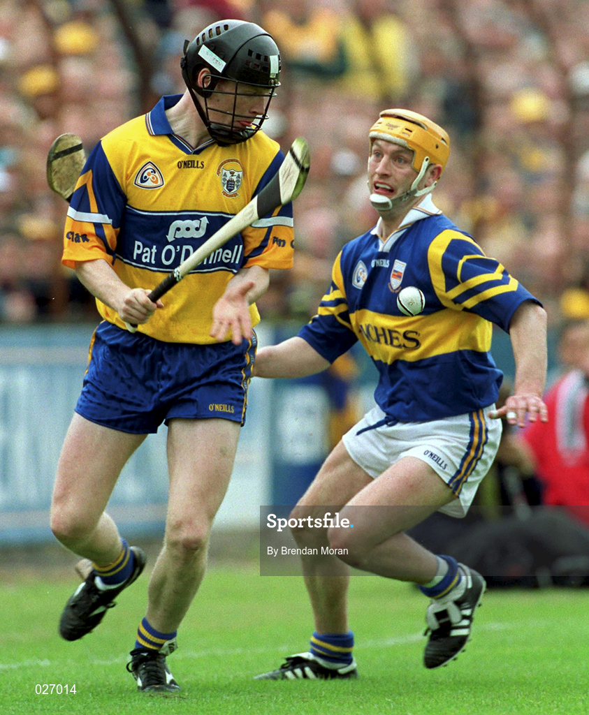 12 June 1999; Frank Lohan of Clare in action against Liam Cahill of Tipperary during the Munster Senior Hurling Championship Semi final Replay match between Clare v Tipperary at Páirc Uí Chaoimh in Cork. Photo by Brendan Moran/Sportsfile
